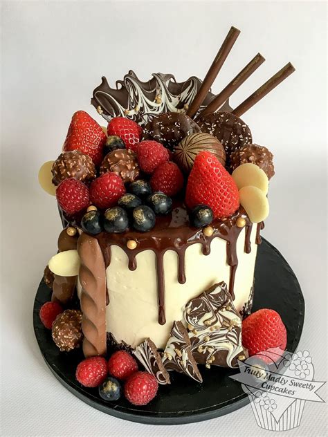 summer fruits and dark chocolate drip cake drip cakes chocolate drip cake desserts