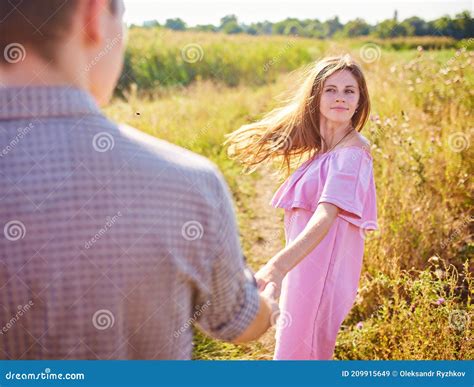 Young Woman Leading Her Lover By Hand Stock Image Image Of Back Male 209915649