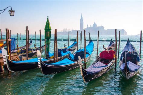 Gondolas And The Island Of San Giorgio Maggiore In Venice Italy