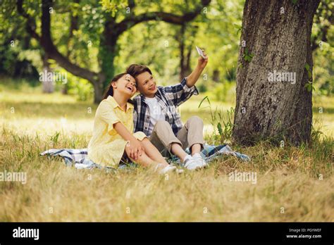 Two Kids Taking Selfies Stock Photo Alamy