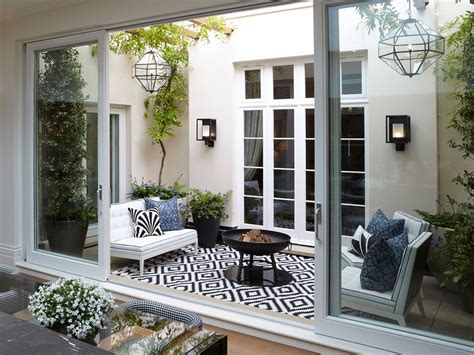19 Courtyard Garden Ideas That Maximise A Small Paved Outdoor Space