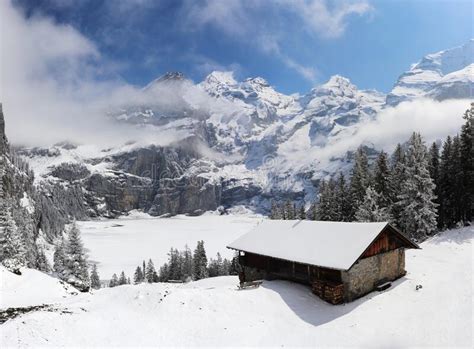 Panoramic Winter Landscape With Frozen Lake Oeschinen And Snow Covered