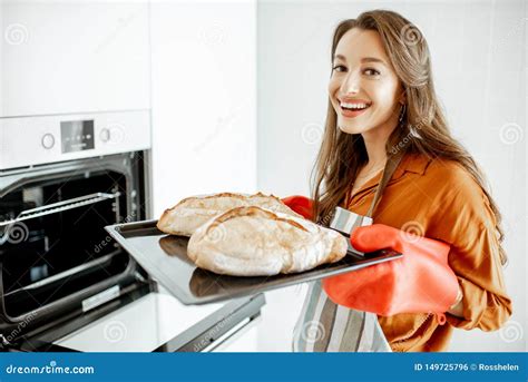 Woman Baking Bread At Home Stock Photo Image Of Stove