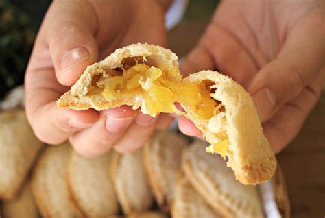 Hands Opening In Half Pineapple Empanadas Mexican Sweet Breads Mexican