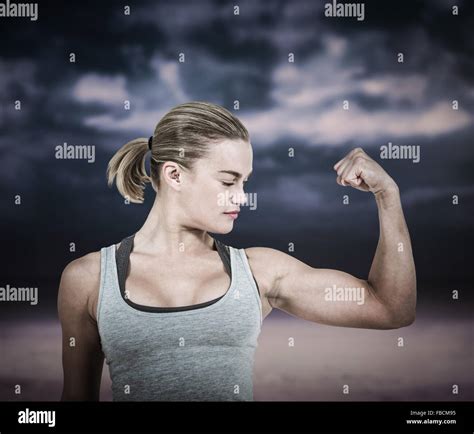 Female Flexing Bicep Muscle Hi Res Stock Photography And Images Alamy