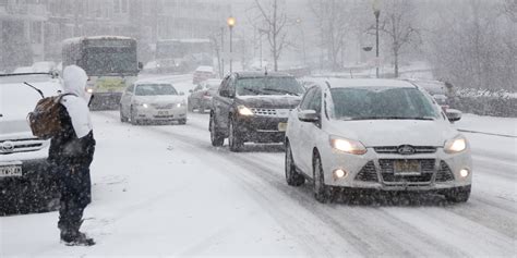 East Coast Snow Storm Snarls Travel Across Northeast And New England