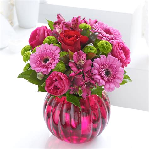 A Globe Vase Of Pink Romance Valentines Flowers Valentines Day