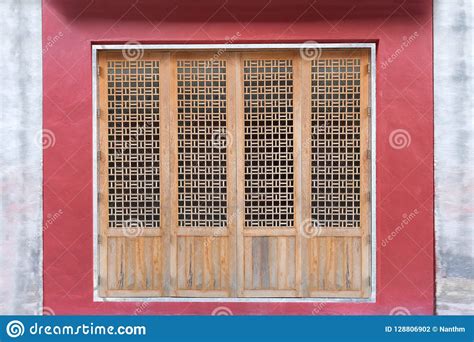 This familiar type of door frame is usually made of wood and wooden shutter panels are inserted. Traditional Chinese Wood Doors Frame Style Stock Photo ...