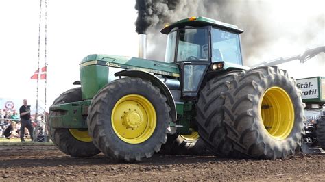 John Deere 4240s 4350 4440 7810 And 8345r Pulling The Heavy Sled In