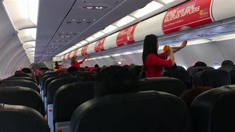 Air asia quick links / table of contents. MACAU - FEBRUARY 24, 2015: Inside AirAsia Plane At ...