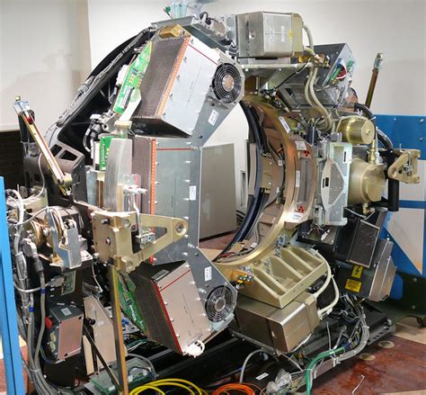 Pet scans are heavily used to locate cancers and identify areas of metastasis. Naked PET/CT scanner | Under the covers of a PET/CT ...