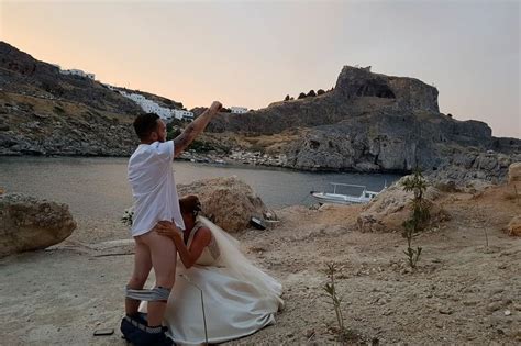 Married In Style British Bride Appears To Perform Sex Act On Husband In Cheeky Wedding Photo