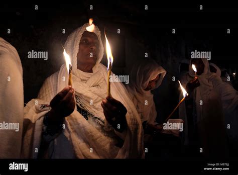 Ethiopian Orthodox Christians Hold Candles During The Holy Fire