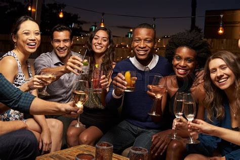 Portrait Of Friends Enjoying Night Out Stock Image Colourbox