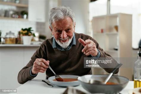 Old Man Eating Bread Photos And Premium High Res Pictures Getty Images