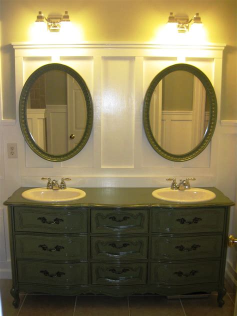 The bold and unique design is highlighted with a black granite counter top. I love bathroom vanities made out of old dressers and ...