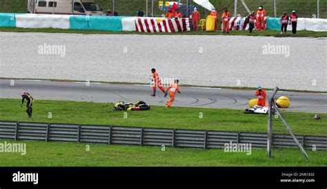 Colin Edwards Of The Us Left Reacts After A Crash Involving Italys