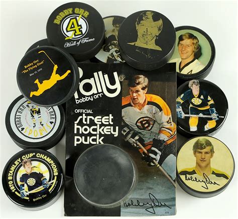 Collection Of Bobby Orr Boston Bruins Hockey Pucks 11