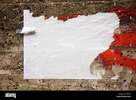 Blank Torn Paper Poster On An Old Brick Wall Stock Photo Alamy