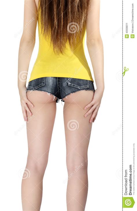 Woman Wearing A Short Jeans Shorts With Yellow Tank Top