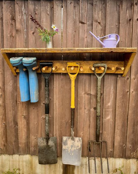 Each hook is designed to lock into place on a 1/8 in. Wooden outdoor welly rack, garden tool storage hanger and ...