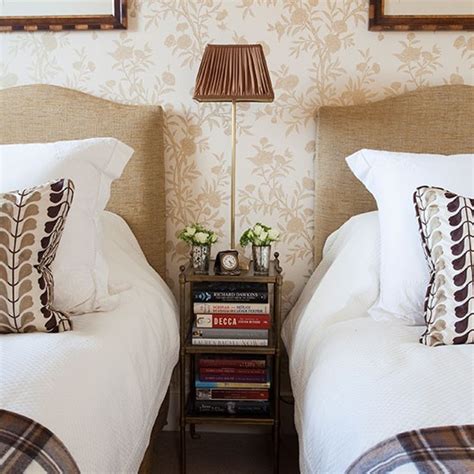 Rustic elements, delicious textures and a touch of sparkle marry his and her style perfectly in this urban cowboy master retreat. Hotel-style room with his and hers beds | Guest bedroom ...