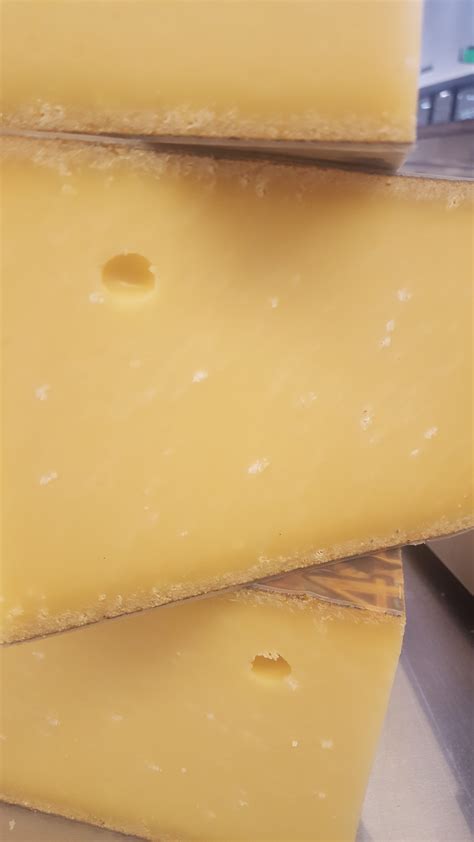 Fat bloom is unappealing in appearance but is fine to eat. There's White Stuff Growing on Your Cheese That Isn't Mold ...