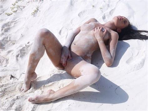 Naked Woman On The Beach