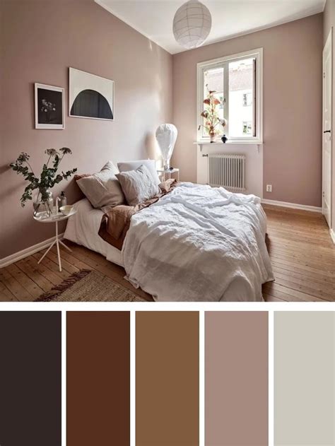 A Bedroom With Brown And White Colors In The Walls Wood Flooring And