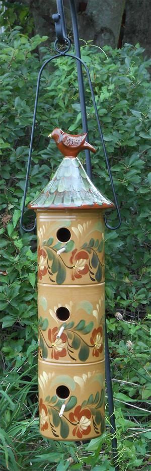Maybe you would like to learn more about one of these? 24.25" Tall Redware Birdhouse with Floral Design. Could use folgers coffee cans glued together ...