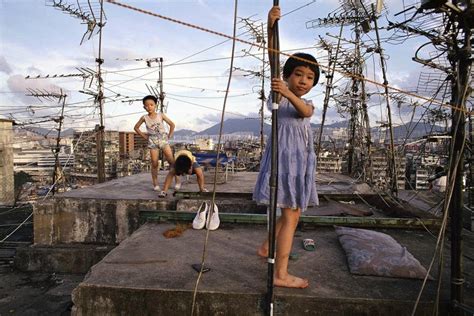 Amazing Photographs Capture Daily Life In Kowloon Walled