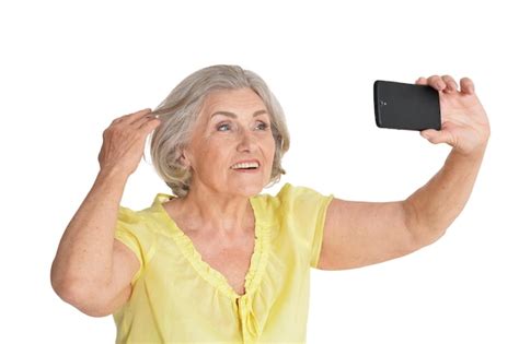 Premium Photo Portrait Of Beautiful Senior Woman Taking Selfie