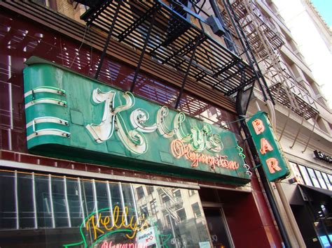 The World Of Jek Kellys Olympian Bar Neon Sign In Portland