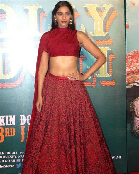 Sonam Kapoor Displays Her Sexy Midriff In Red Dress