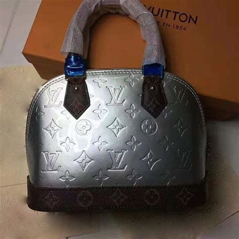 Louis Vuitton Lv Women Alma Bb Handbag In Metallic Monogram Vernis
