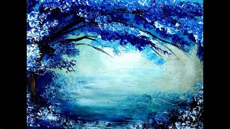 Painting Tree In Blue And White Acrylic Colors Over Its
