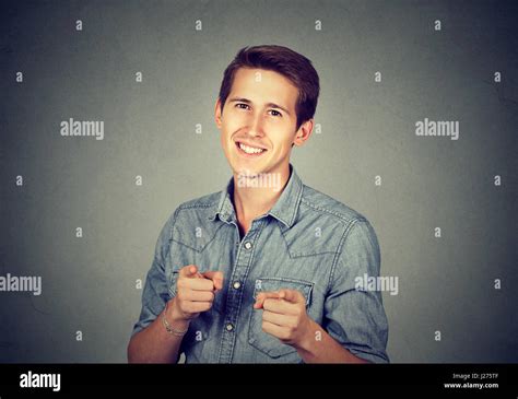 Portrait Handsome Young Smiling Man Giving Thumbs Up Pointing Fingers
