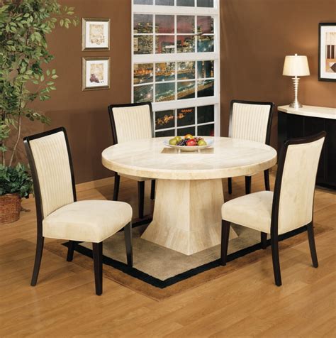 Square dining tables are commonly paired with rectangular or square rugs to reinforce the overall silhouette of the table and room. Dwellers Without Decorators: 5 Area Rug Rules you need to ...