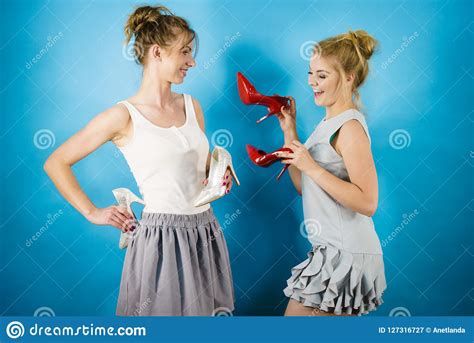 Women Presenting High Heels Shoes Stock Image Image Of Friends