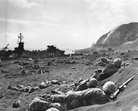 Photo Us Marines Burrowing In The Volcanic Sand On The Beach Of Iwo