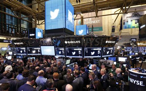 Following its reopening, trump tweeted fewer traders will be on the floor to support social distancing requirements; TWTR: Photos from the NYSE as Twitter goes public