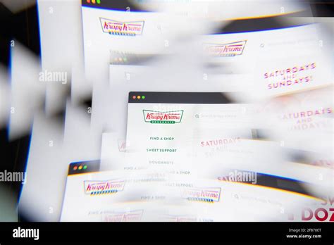 Milan Italy April Krispy Kreme Logo On Laptop Screen Seen Through An Optical Prism