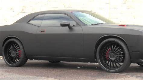 Matte red would look pretty awesome, here is a vid of one i saw on youtube, its more of a matte clearcoat over torred if you ask me but very different. dodge challenger matte black - YouTube