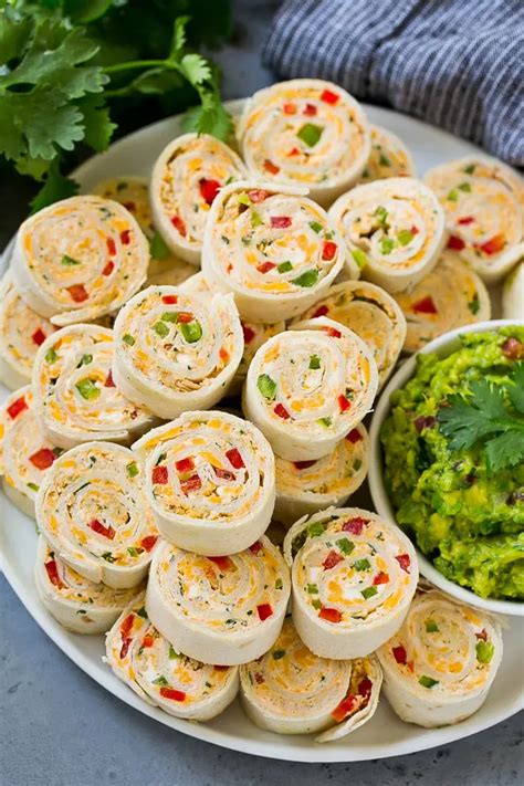 Taco Pinwheels Made With Cream Cheese Chicken Cheddar Cheese And Bell