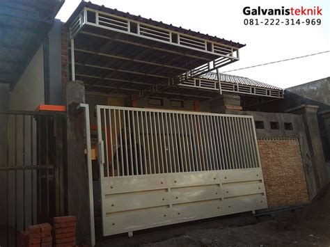 Rangka besi hollow 48 18 atap policarbonat solarlite 5mm. Kanopi minimalis dengan bahan atap zingalume, Rangka besi ...