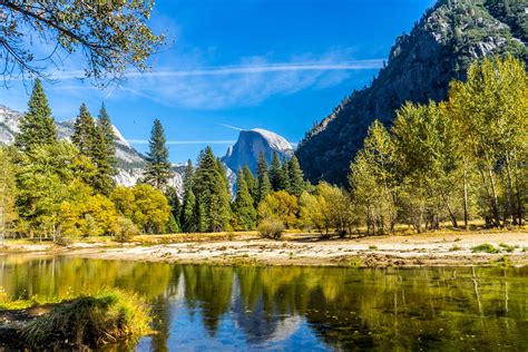 Half Dome Reflecting Of The Merced River In Yosemite Valley Oc