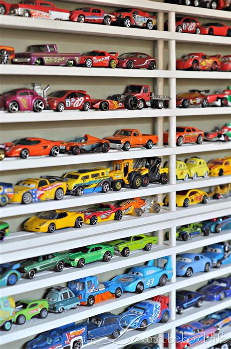 Send your matchbox cars through four levels of activity, wind around the spiral ramp, stop to refuel at the gas pump, or. a LO and behold life: DIY Matchbox Car Garage ...