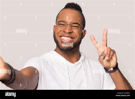 Happy African American Man Smiling Posing For Selfie Stock Photo Alamy