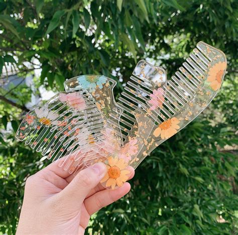 Surrounding this large vase is a beautifully woven wicker sleeve that truly enhances its appearance. Custom Resin Pressed Real Flower Comb | Etsy | Diy resin ...