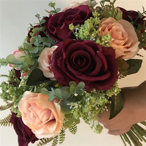 A Bridal Bouquet Of Burgundy And Blush Pink Flowers Abigailrose
